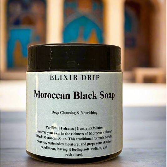 Jar of Moroccan Black Soap with 'Elixir Drip' branding on a blurred background